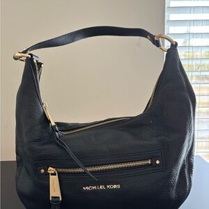 Michael Kors Black Hobo Bag with Gold Accents